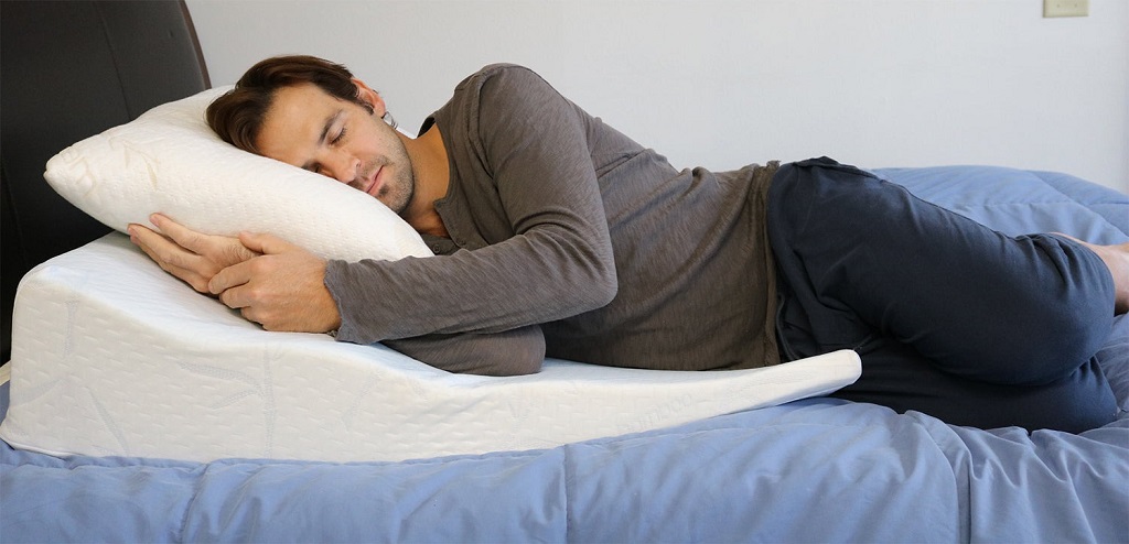 Is it okay to sleep on your stomach with a wedge pillow