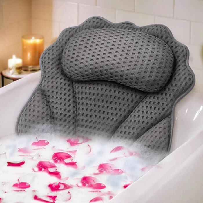 RUVINCE ergonomic luxury bath pillow resting on the edge of a white bathtub, featuring soft quilted padding and contoured support for the head, neck, and shoulders.
