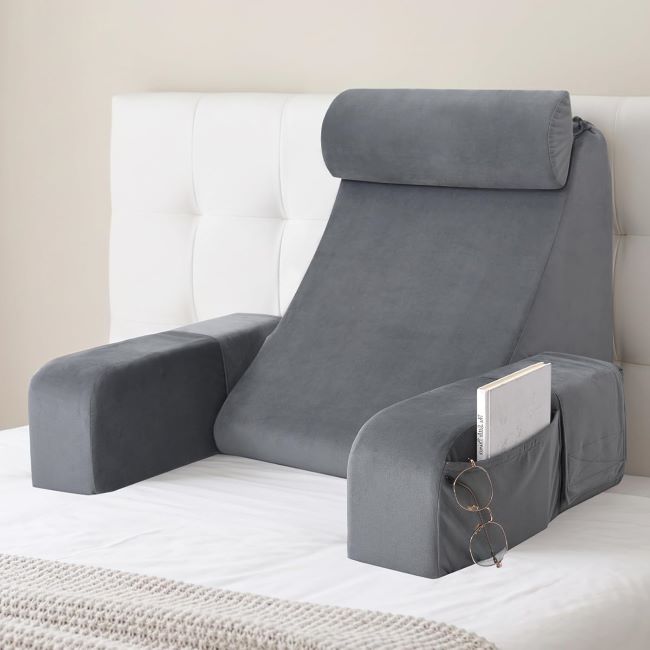 ENITYA back support reading pillow with armrests and storage pockets, designed for sitting up in bed, gaming, or recovery comfort