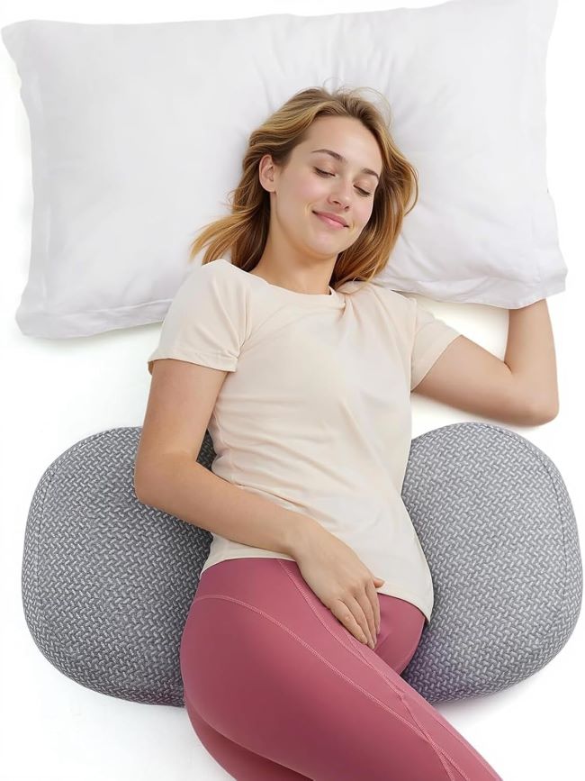 Momcozy W-shaped maternity pillow designed for pregnancy support, improving comfort for back, belly, and hip alignment during sleep