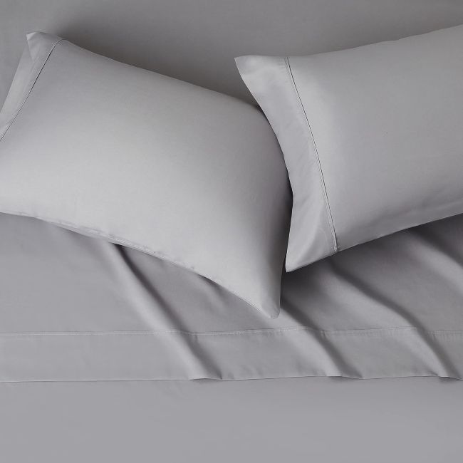 Amazon Basics bed sheets creating a comfortable, lightweight sleep setup in California