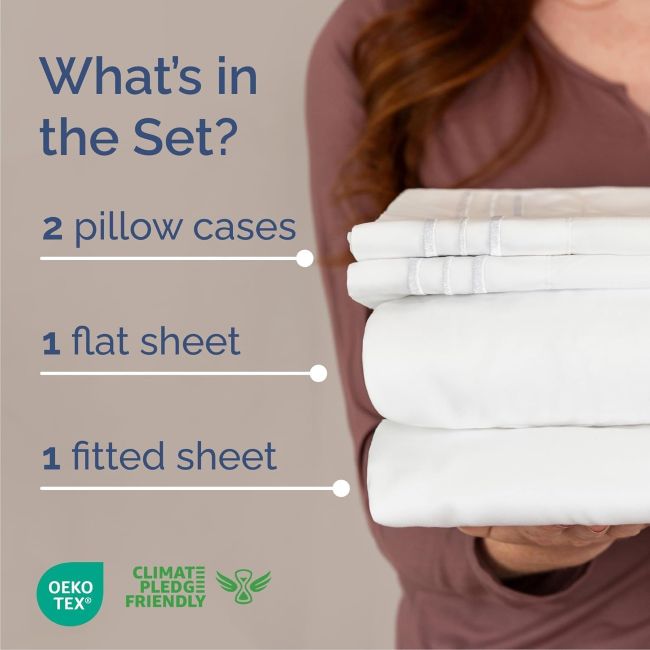 White CGK Unlimited queen sheet set styled on a modern bed