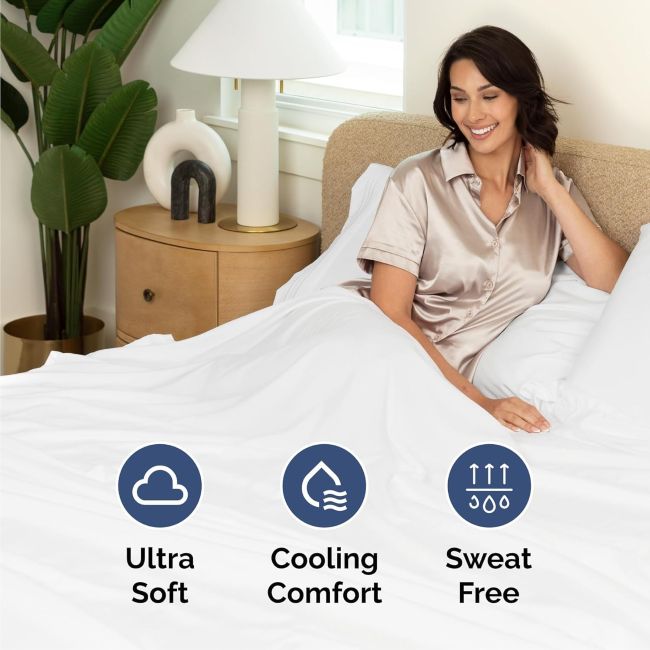 CGK Unlimited soft white bed sheets for a fresh and elegant bedroom setup